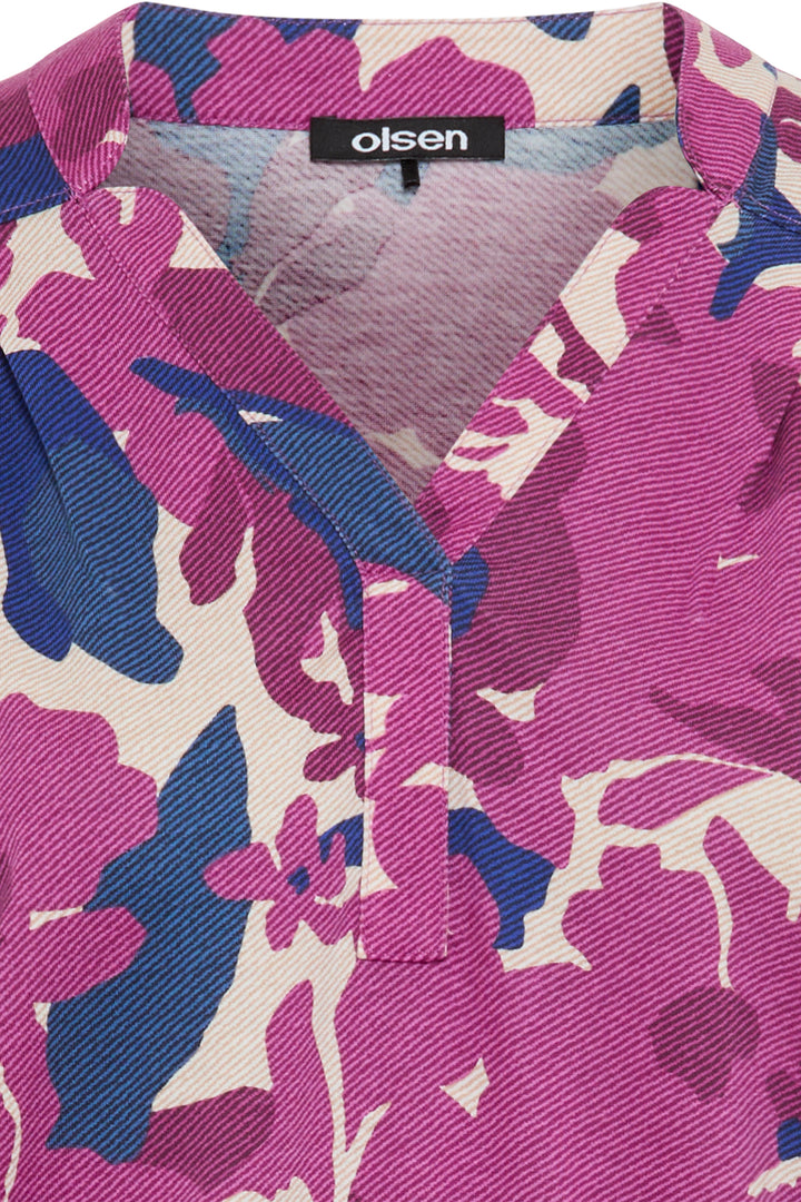 Floral patterned jacket with 'olsen' branding on a visible label.