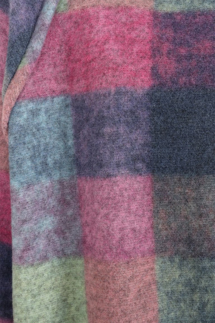 Close-up of a fabric with multicolored checkered pattern
