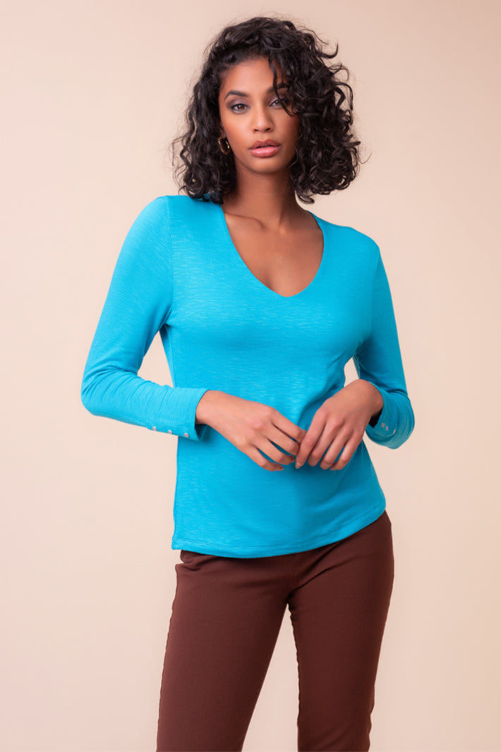 Alison Sheri A48136 teal V-neck top at Experience Boutique