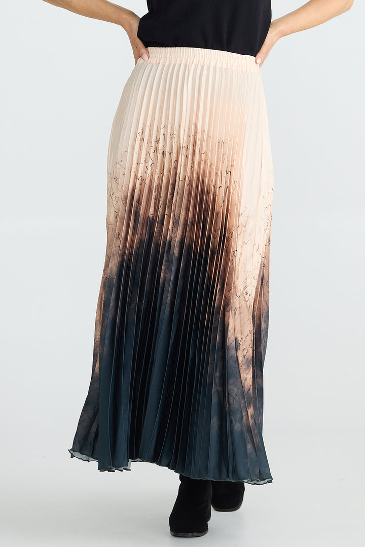 Long pleated skirt with gradient color from beige to black on a white background