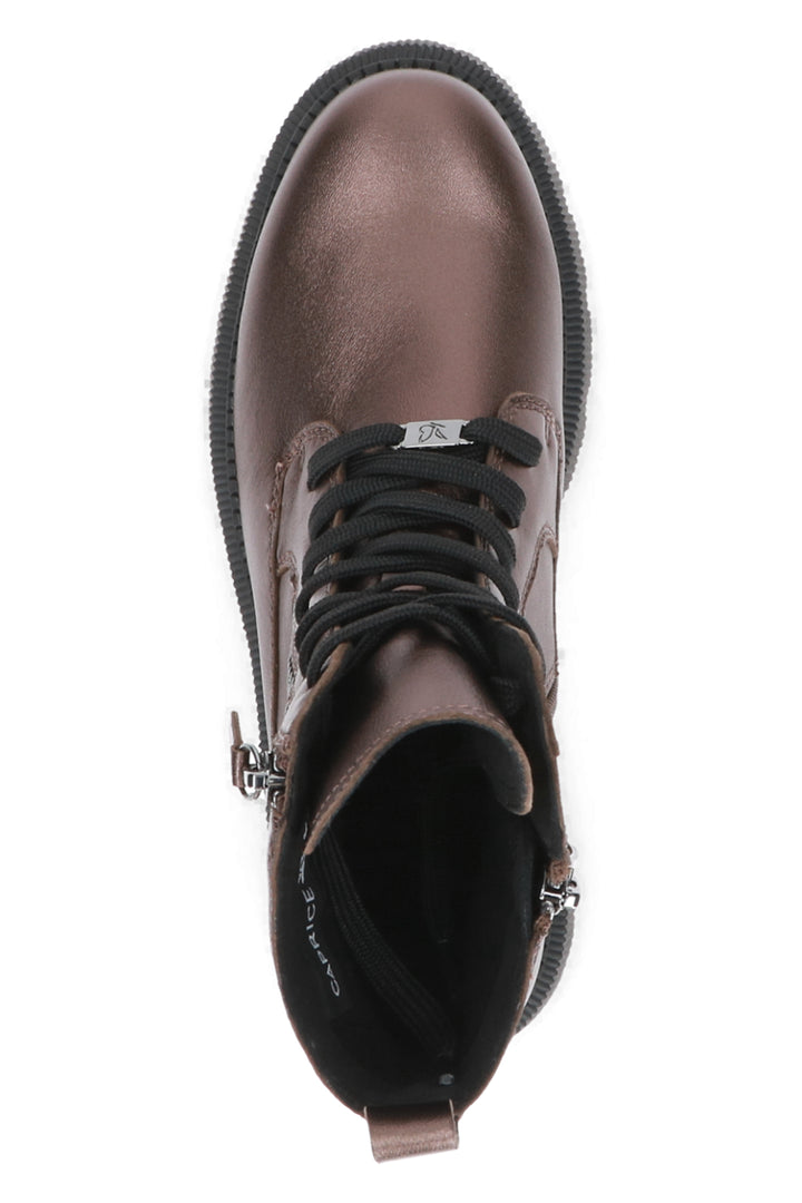 Brown leather boot with black laces on a white background