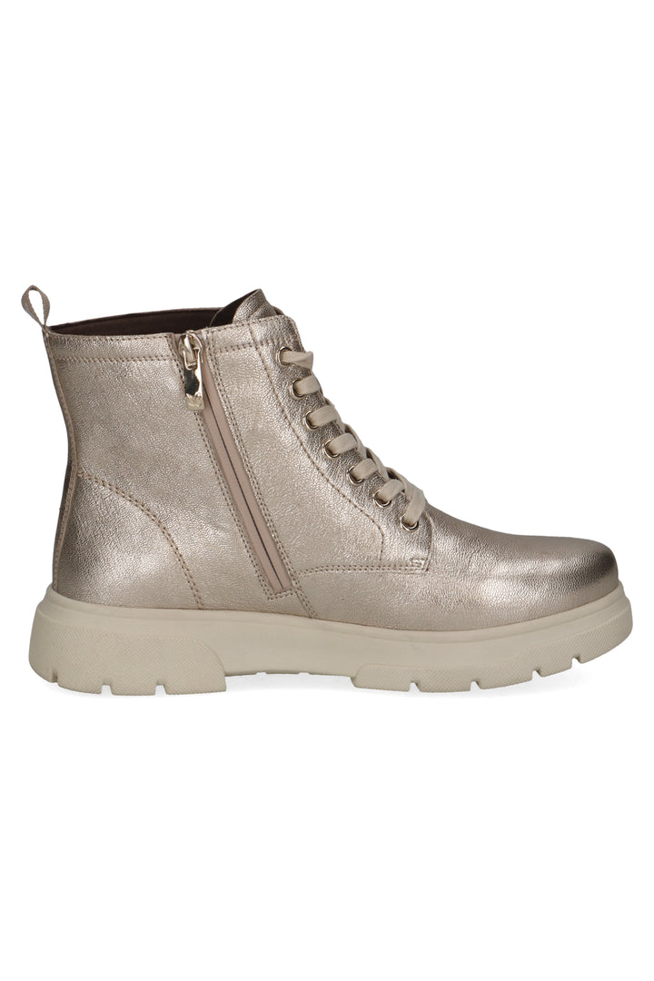 Metallic silver boot on a white background