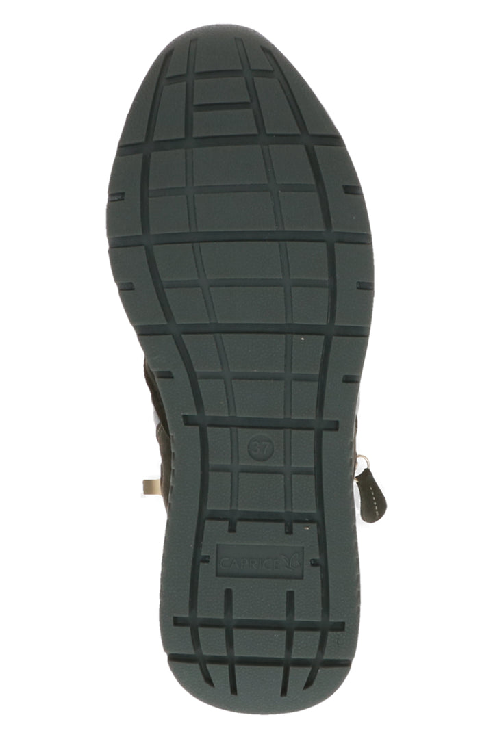 Close-up of a sandal sole with tread pattern on a white background