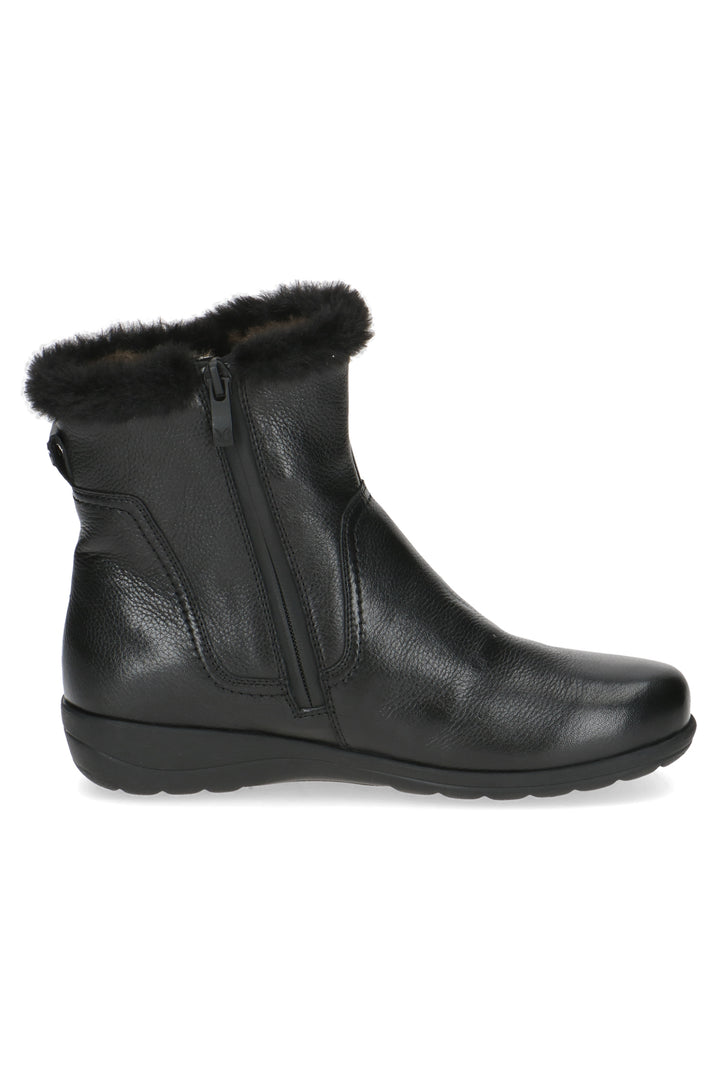 Black leather ankle boot with fur trim on a white background