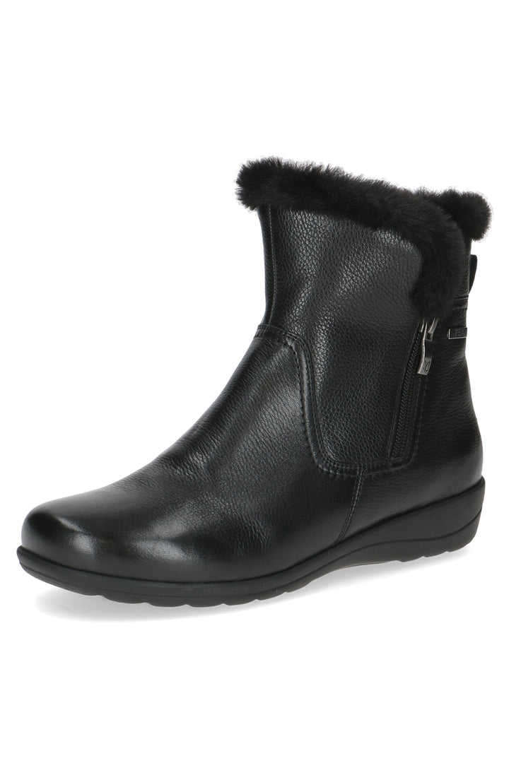 Black ankle boot with fur trim on a white background