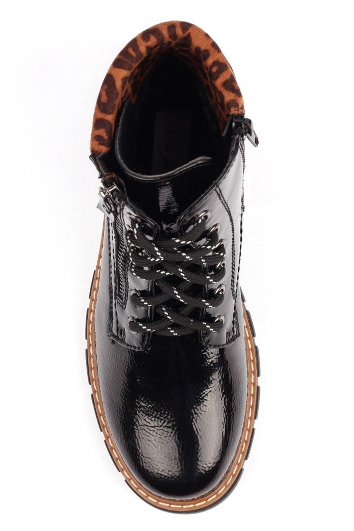 Black patent leather boot with brown accents on a white background