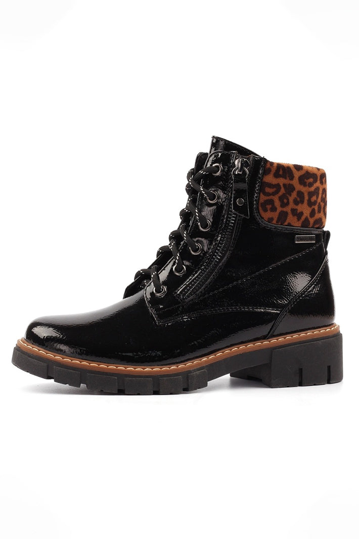 Black leather boot with leopard print lining on a white background