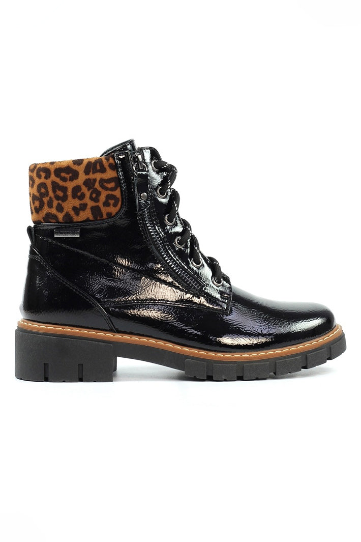 Black leather boot with leopard print lining on a white background