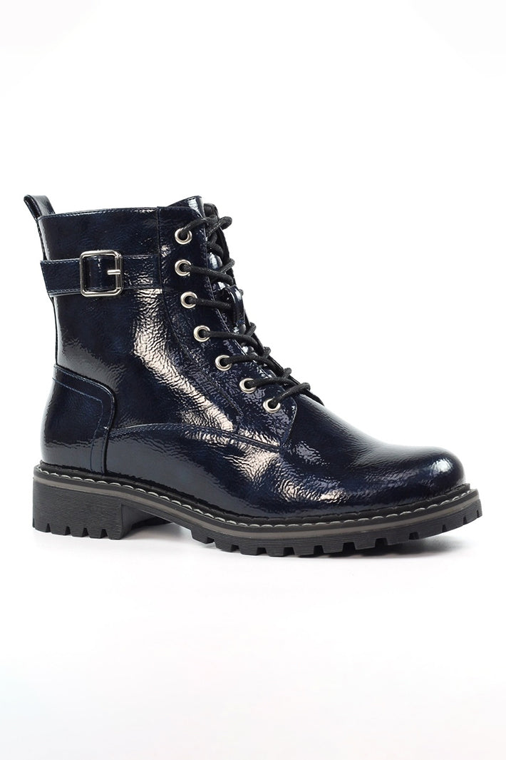 Navy leather boot with buckle on a white background