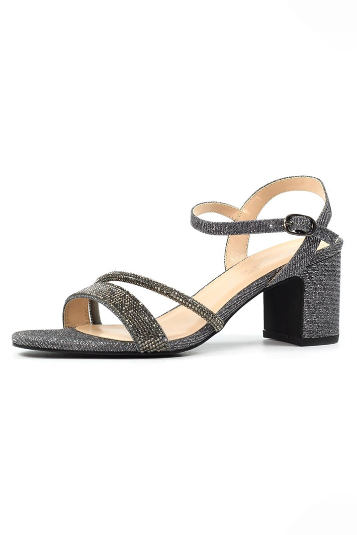 Black glittery sandal with a block heel on a white background