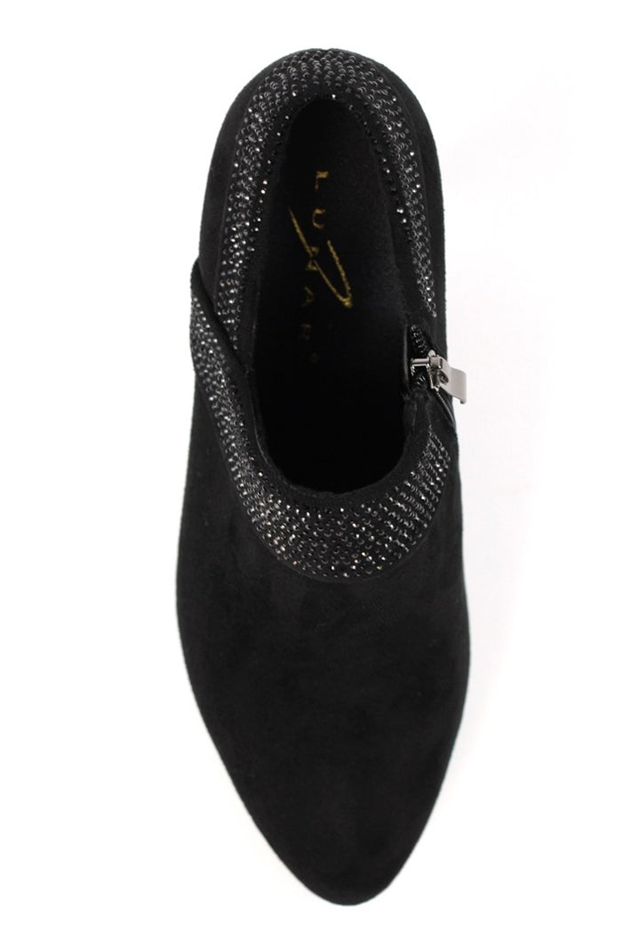 Black shoe with decorative embellishments on a white background