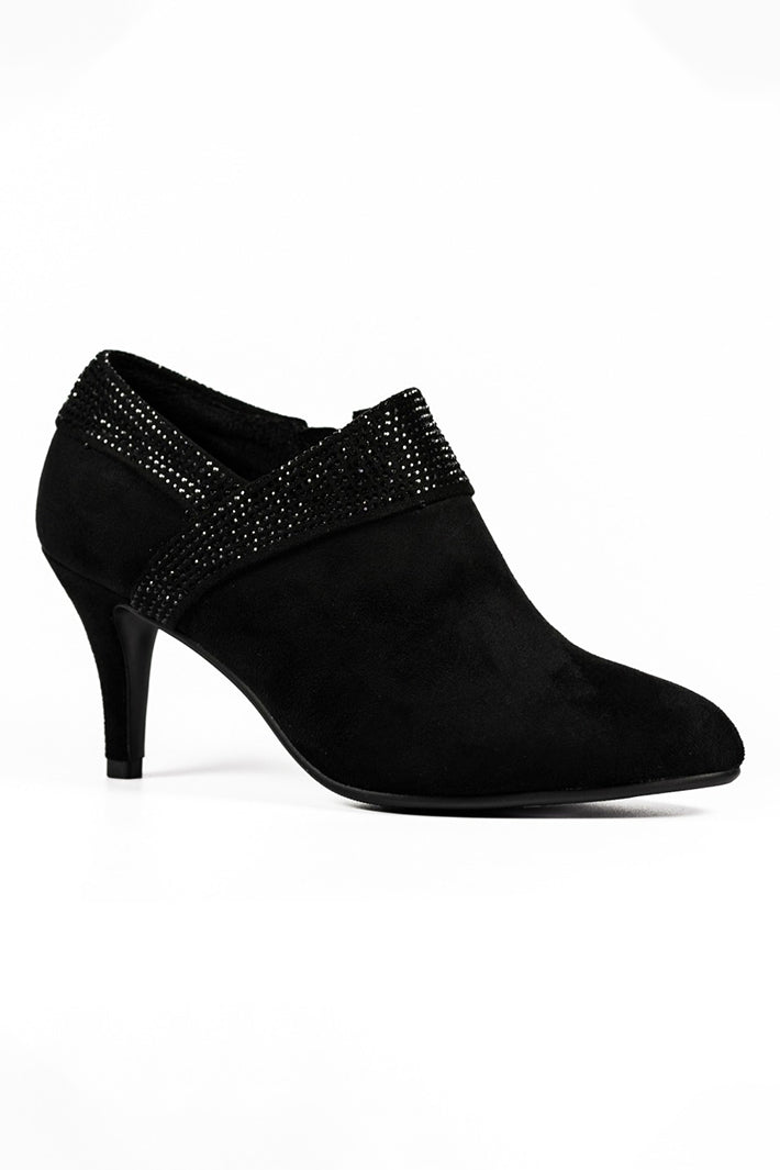 Black high-heeled shoe with embellishments on a white background