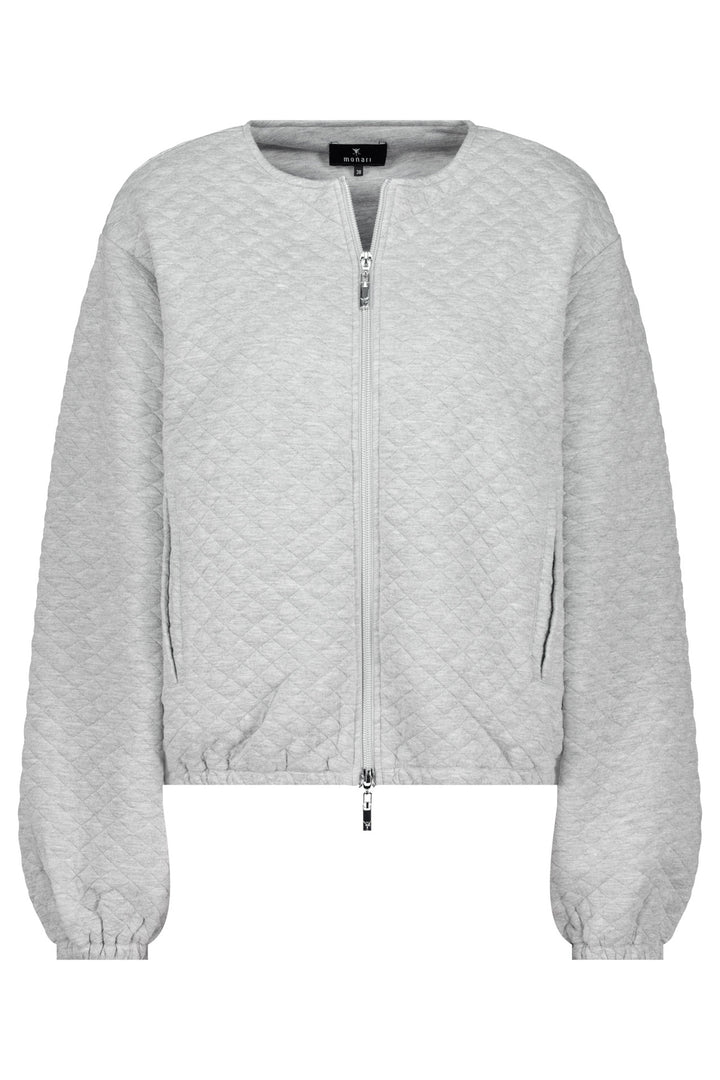 Light gray quilted jacket on a white background