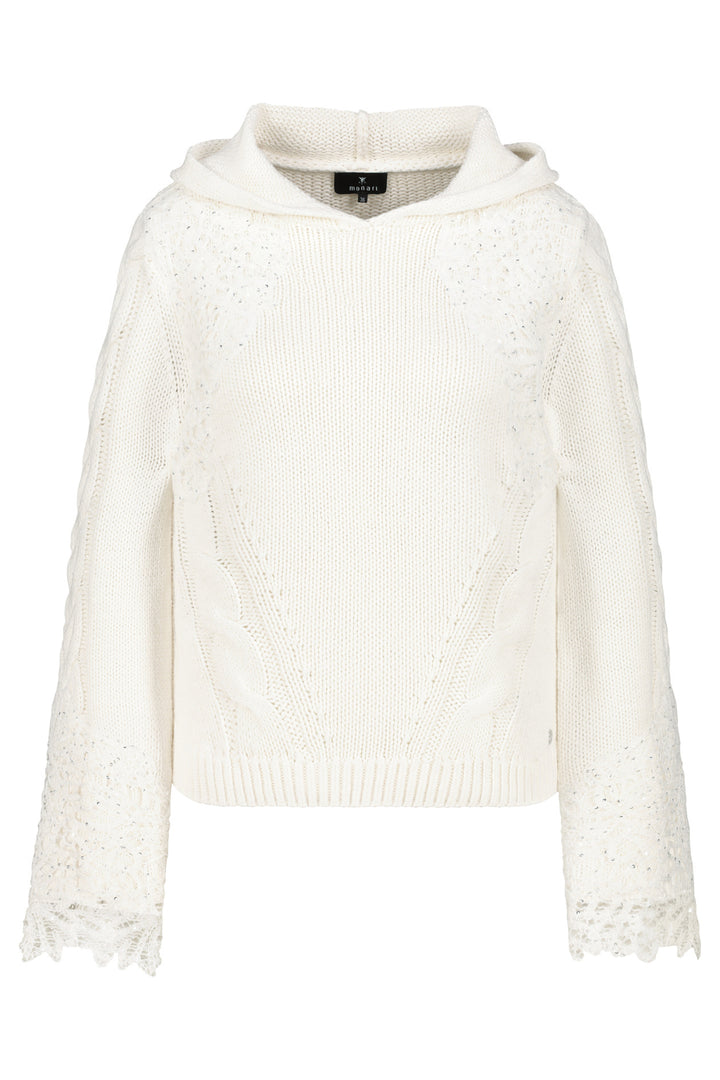 White lace-trimmed sweater on a white background