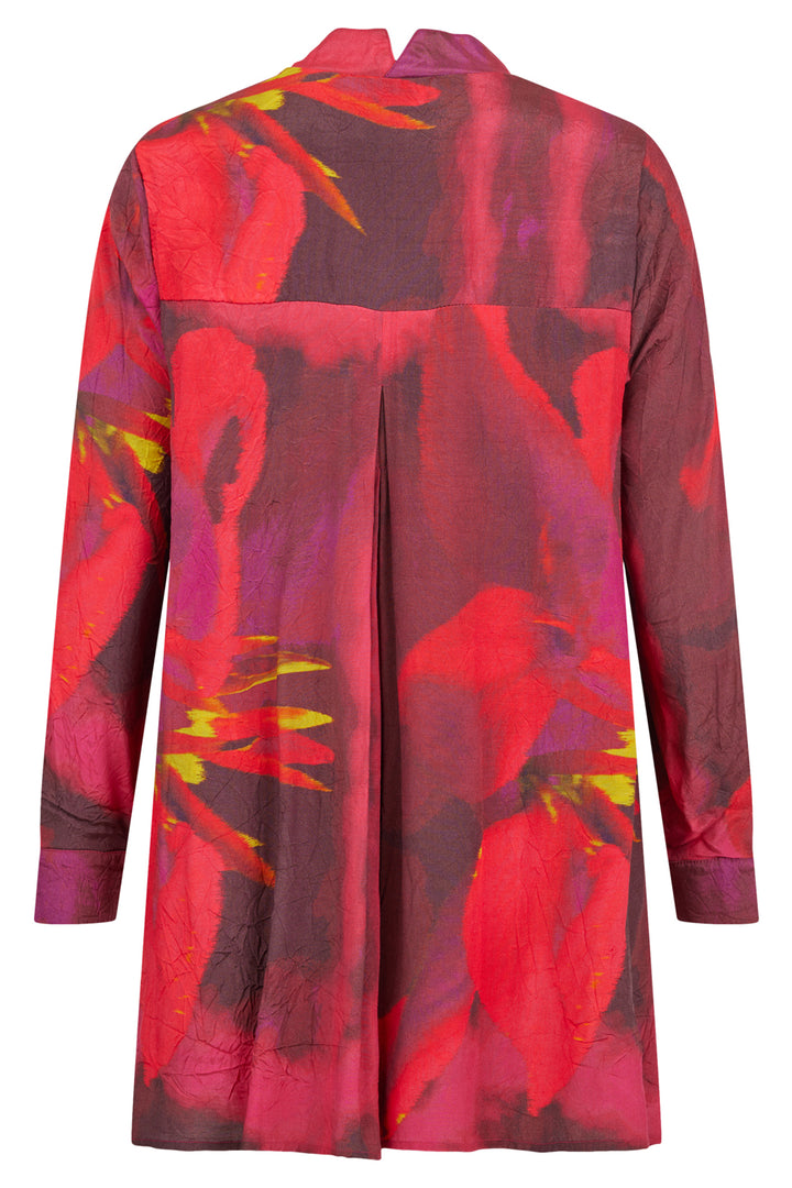 Red and purple floral patterned dress on a white background
