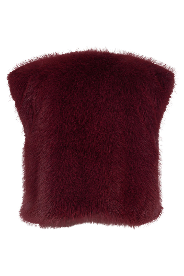 Maroon fur pillow on a white background