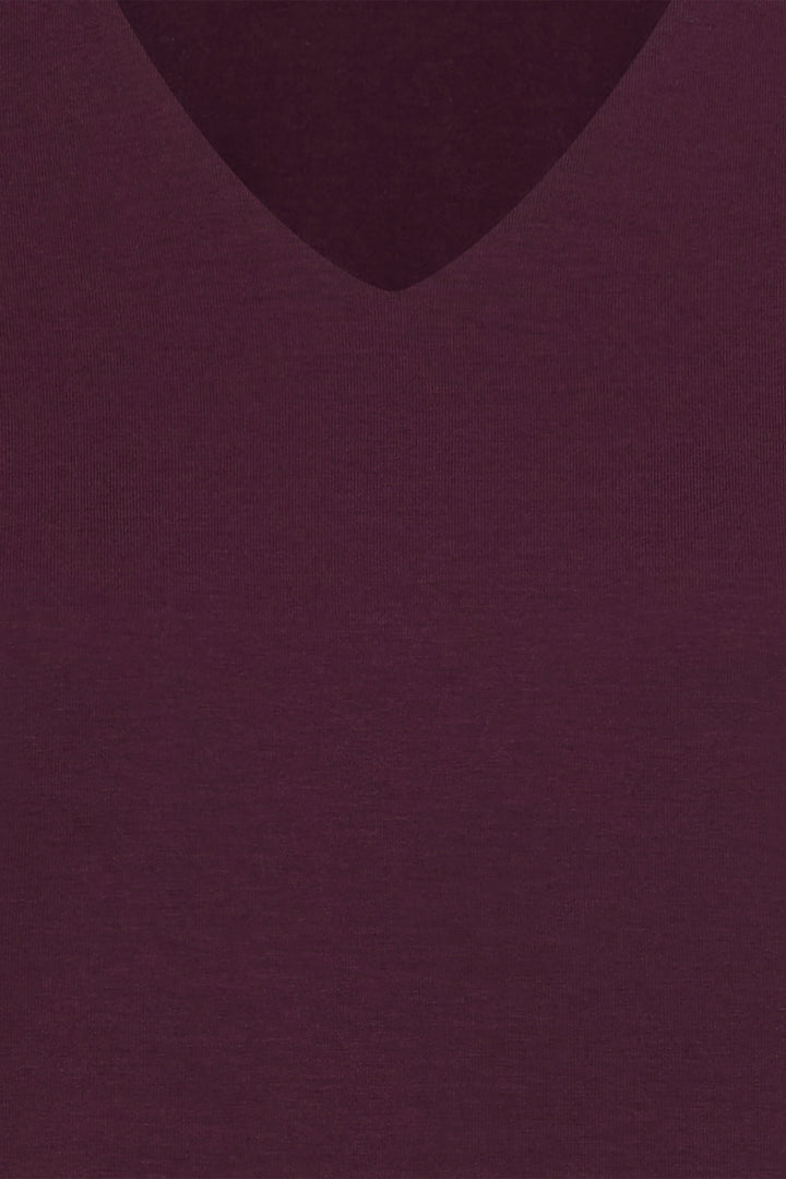Solid burgundy t-shirt close-up