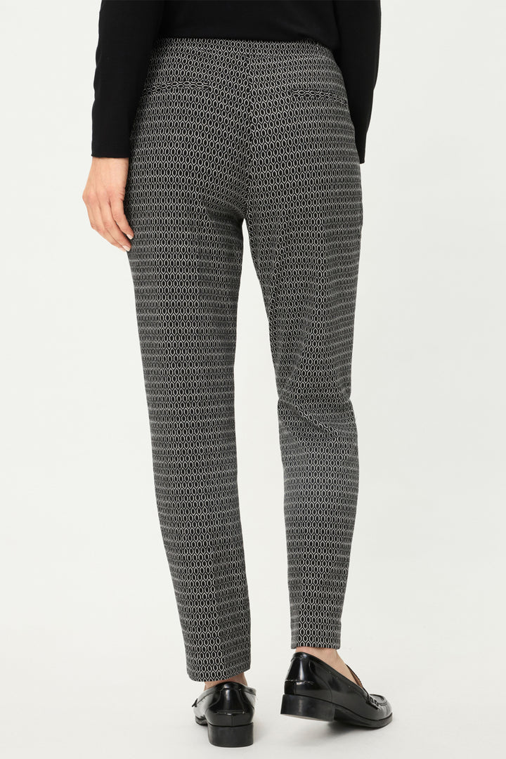 Patterned gray pants worn by a person on a white background