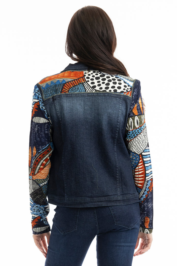 Denim jacket with colorful patterned sleeves worn by a person on a white background