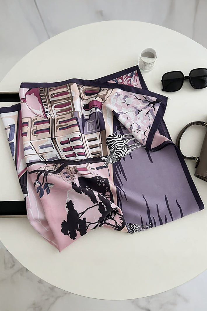 Colorful scarf with artistic design on a white surface