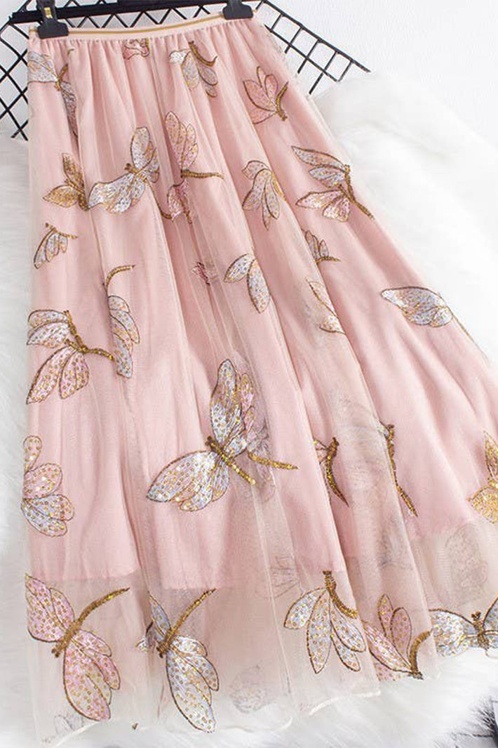 Pink skirt with butterfly patterns on a white background
