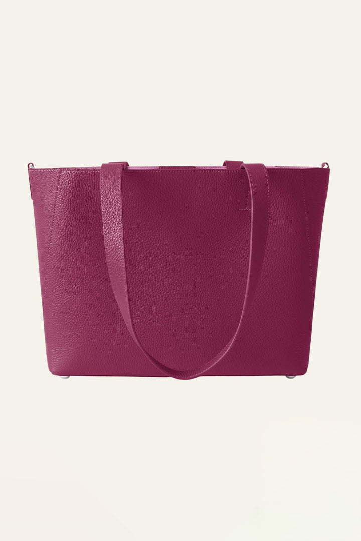 Pink tote bag on a light beige background