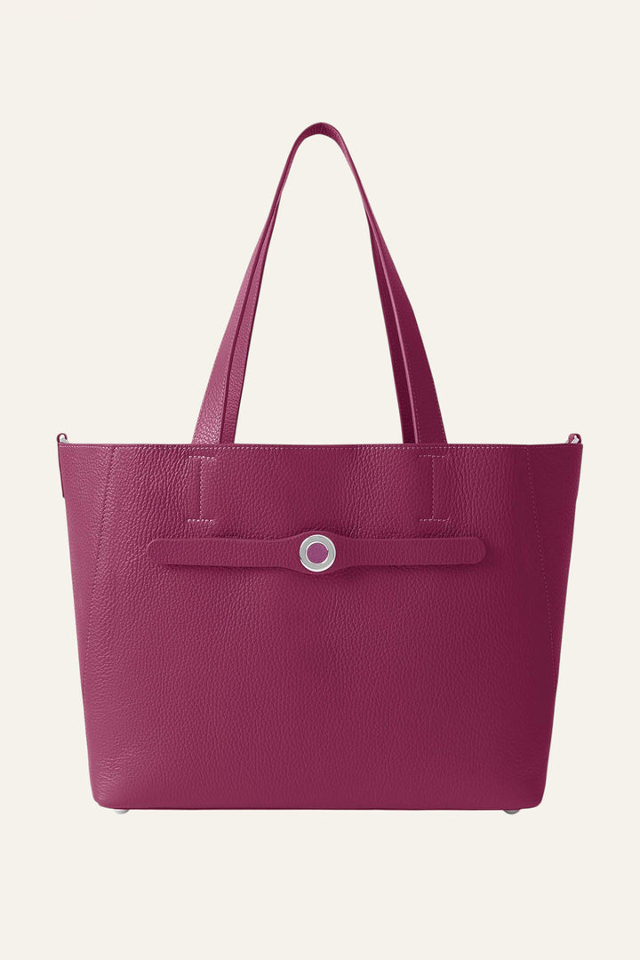 Pink tote bag with a handle on a white background