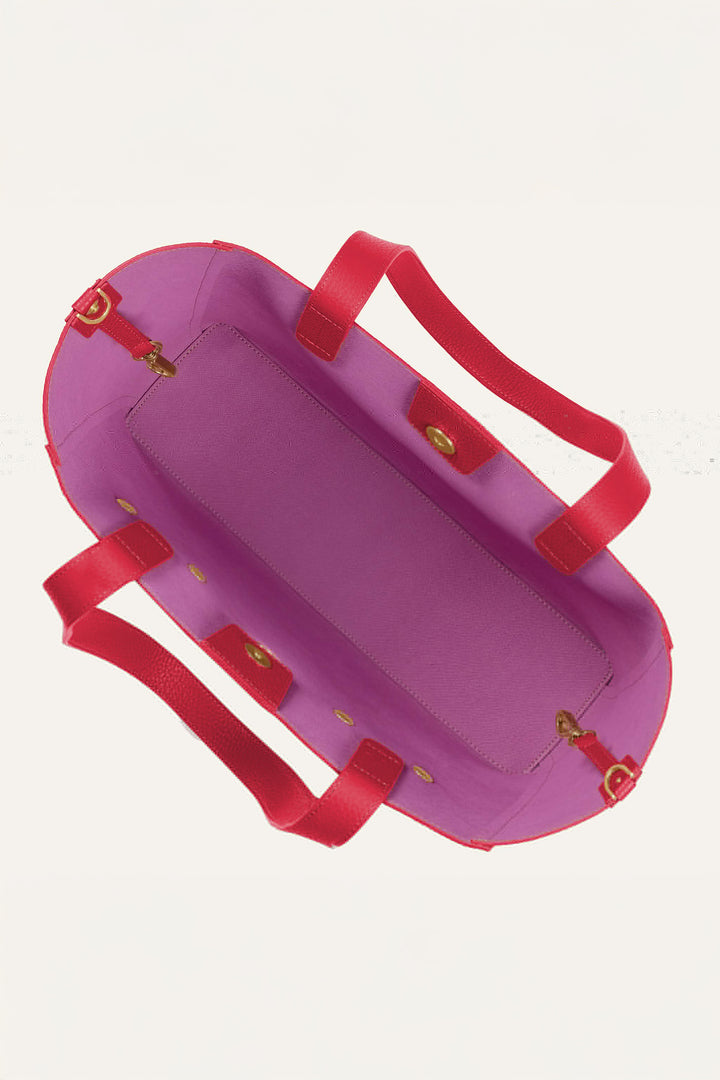 Purple bag with red handles on a white background