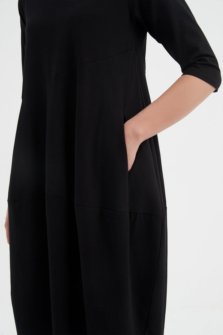 Black dress with a plain background