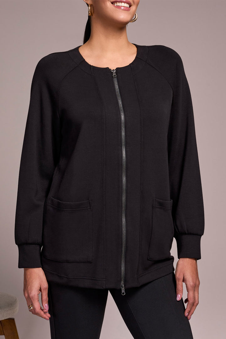 Black zip-up sweatshirt worn by a person on a neutral background