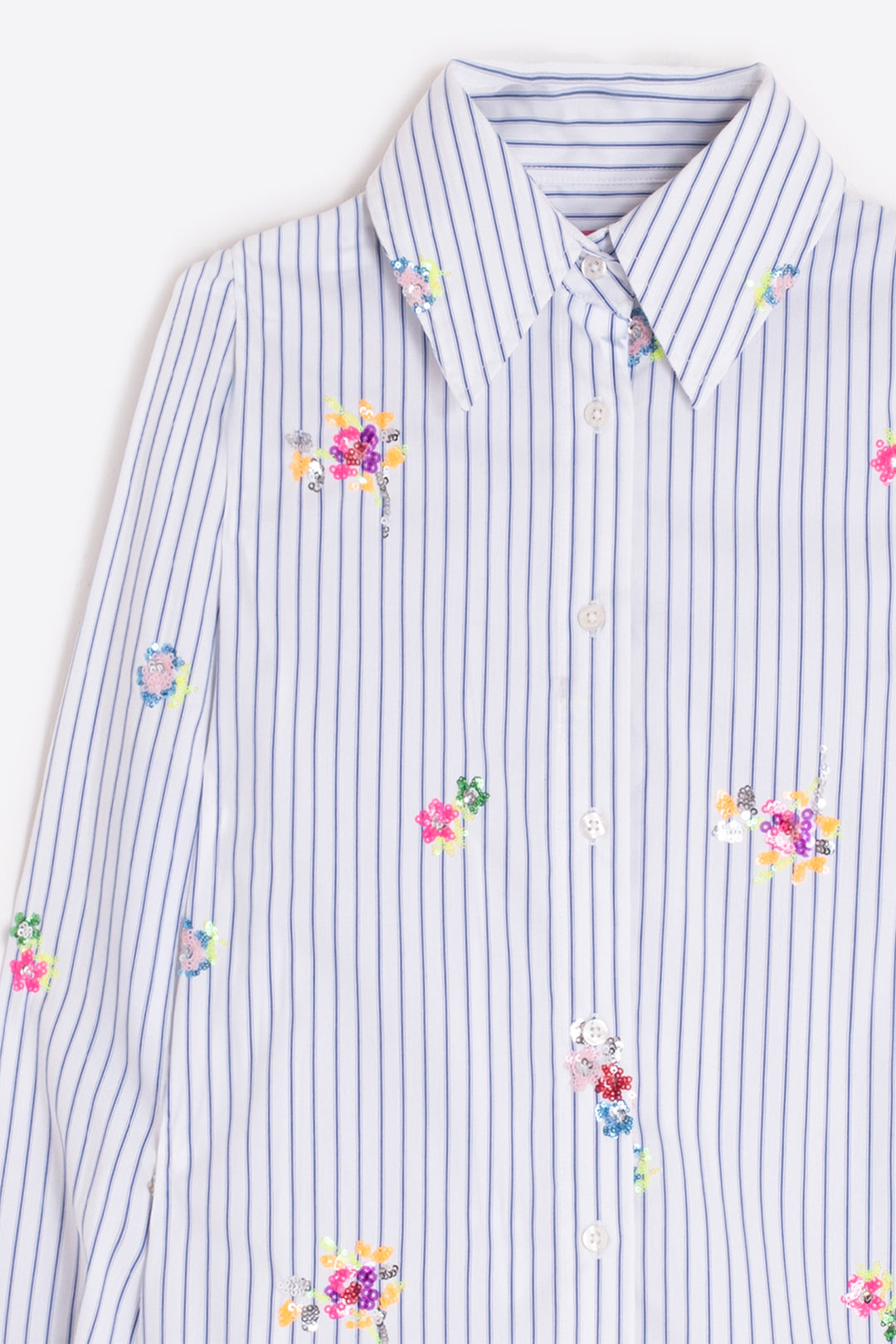 Striped shirt with floral patterns on a white background