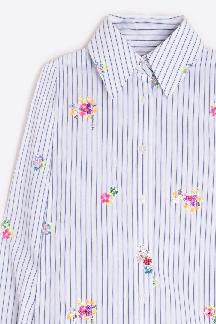 Striped shirt with floral patterns on a white background